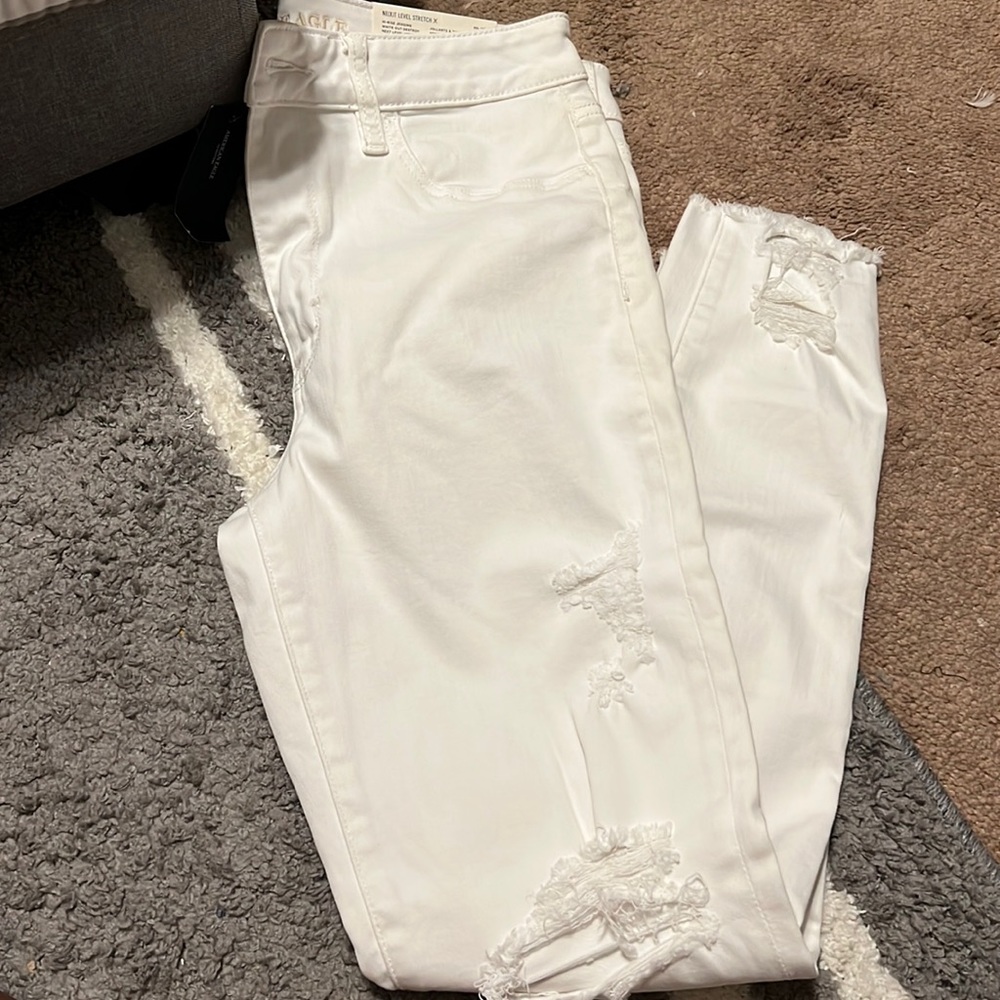 American Eagle Next Level Stretch White Distressed Jeans - New Size 12